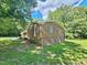 Lovely single story brick home surrounded by mature trees and landscaping at 5614 Skyline Dr, Durham, NC 27712