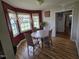 Cozy breakfast nook with lots of light and wood floors at 5810 Stardust Ct, Durham, NC 27712