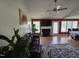 Inviting living room featuring a brick fireplace, and wood floors at 5810 Stardust Ct, Durham, NC 27712