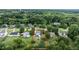Aerial view of property with approximate boundary lines, showcasing lush surroundings at 601 Country Ln, Holly Springs, NC 27540