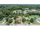 Aerial view showcasing the property's boundaries within a lush, green neighborhood at 601 Country Ln, Holly Springs, NC 27540