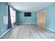 Bright living room featuring sleek floors, a neutral color scheme, and great natural light at 601 Country Ln, Holly Springs, NC 27540
