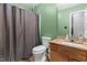 Bathroom displaying neutral paint, shower curtain, and a toilet at 601 Southampton Dr, Knightdale, NC 27545