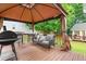Cozy gazebo on the deck featuring outdoor furniture for entertaining at 601 Southampton Dr, Knightdale, NC 27545