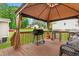 Spacious outdoor deck featuring a barbecue grill and furniture at 601 Southampton Dr, Knightdale, NC 27545