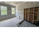 Bathroom with two windows and modern plumbing, offering natural light and a clean design at 6505 Burnette Flower Way, Raleigh, NC 27612