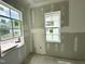 Bedroom featuring two bright windows, providing natural light and view, ready for personalization at 6505 Burnette Flower Way, Raleigh, NC 27612