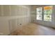 Bright bedroom features two windows, offering natural light and outdoor views, ready to be personalized at 6505 Burnette Flower Way, Raleigh, NC 27612