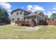 Spacious backyard with a wooden deck, ideal for outdoor gatherings and enjoying the serene surroundings at 6521 Sunset Manor Dr, Wake Forest, NC 27587