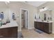 The bright bathroom features a double sink vanity, ample counter space, and modern fixtures at 6521 Sunset Manor Dr, Wake Forest, NC 27587