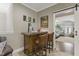 Charming home bar with a leather-topped bar, comfortable stools, and a stylish décor at 6521 Sunset Manor Dr, Wake Forest, NC 27587