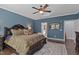 Elegant main bedroom offers a luxurious king-size bed and stylish furnishings at 6521 Sunset Manor Dr, Wake Forest, NC 27587