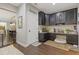 Practical mud room featuring built-in cabinets, counter space, and a pet bed at 6521 Sunset Manor Dr, Wake Forest, NC 27587