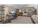 Bright office area featuring hardwood floors, dual desk setup, and ample decor at 6521 Sunset Manor Dr, Wake Forest, NC 27587