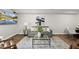 Open living room with hardwood floors, neutral walls, and modern decor at 704 Walcott Way, Cary, NC 27519