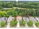 Beautiful suburban homes surrounded by lush green trees, offering a serene and private setting at 7768 Berry Crest Ave, Raleigh, NC 27617