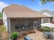 Beautiful screened porch with outdoor seating and a patio, perfect for enjoying the backyard at 7768 Berry Crest Ave, Raleigh, NC 27617