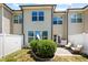 Private backyard offers an inviting outdoor space with comfortable seating and a tidy lawn at 7807 Elmshire Way, Raleigh, NC 27616