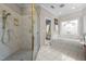 Bathroom featuring walk-in shower, soaking tub with decorative window, and private balcony access at 7918 Dairy Ridge Rd, Mebane, NC 27302