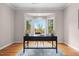 Sunlit office space with a large window and serene views of the backyard at 7918 Dairy Ridge Rd, Mebane, NC 27302