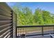 Private balcony overlooking lush greenery, perfect for relaxing and enjoying the outdoors at 805 Winter Meadow Dr, Wake Forest, NC 27587