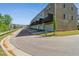 Exterior view of townhome with attached garages and private balconies at 805 Winter Meadow Dr, Wake Forest, NC 27587