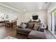 Comfortable living area with a plush sectional sofa and plenty of natural light at 805 Winter Meadow Dr, Wake Forest, NC 27587