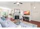 Comfortable living area boasts a vaulted ceiling and seamless flow to dining at 8116 Owenston Ct, Raleigh, NC 27612