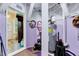 Basement utility area with water heater, electrical components, and access to other rooms at 819 & 818 Hilltop Cir, Sanford, NC 27332