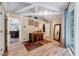 Bedroom with wood-look floors, closet, and access to the kitchen at 819 & 818 Hilltop Cir, Sanford, NC 27332