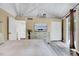 Well-lit bedroom has neutral tones, and a TV with closet access and outside views at 819 & 818 Hilltop Cir, Sanford, NC 27332