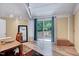 Bedroom with sliding glass doors, natural light, and wood-look flooring at 819 & 818 Hilltop Cir, Sanford, NC 27332