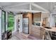 Charming kitchen featuring stainless appliances, granite counters, and wooded views at 819 & 818 Hilltop Cir, Sanford, NC 27332