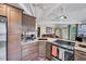 Charming kitchen featuring stainless appliances, granite counters, and open floorplan at 819 & 818 Hilltop Cir, Sanford, NC 27332