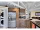 Charming kitchen featuring stainless appliances and granite countertops at 819 & 818 Hilltop Cir, Sanford, NC 27332