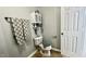 Bathroom featuring a toilet, decorative towels and shelves at 923 Springfork Dr, Cary, NC 27513