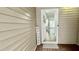 Welcoming entryway with a decorative wreath and 'Welcome' sign on the front door at 923 Springfork Dr, Cary, NC 27513