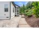 Picturesque backyard with garden views, offering a serene environment adjacent to the home at 9713 San Remo Pl, Wake Forest, NC 27587