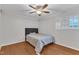 Bedroom featuring a ceiling fan, window and plenty of space to relax and unwind at 1008 Sandlin Pl # J, Raleigh, NC 27606