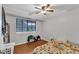 Bedroom featuring a ceiling fan, window and plenty of space to relax and unwind at 1008 Sandlin Pl # J, Raleigh, NC 27606