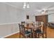 Dining room featuring a dining table with hardwood floors at 1008 Sandlin Pl # J, Raleigh, NC 27606