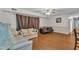 Spacious living room featuring wood flooring and neutral-colored furniture at 1008 Sandlin Pl # J, Raleigh, NC 27606