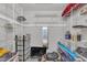 Spacious walk-in closet with white wire shelving, storage, and a view to the bathroom at 1008 Sandlin Pl # J, Raleigh, NC 27606