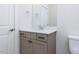 Bathroom featuring a vanity with a white countertop and a stylish mirror at 1013 Coldspring Circle, Durham, NC 27705