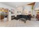 Spacious living room with fireplace, tile flooring, and access to other rooms at 103 Pony Express Cv, Louisburg, NC 27549