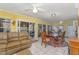 Inviting living space featuring a dining area and comfortable seating, perfect for relaxing and entertaining guests at 103 Pony Express Cv, Louisburg, NC 27549