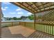Wooden deck with lattice and wooden railings, overlooking a backyard at 105 Poplar Dr. Dr, Clayton, NC 27520