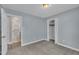 Comfortable bedroom features neutral carpet and access to the bathroom and closet at 105 Poplar Dr. Dr, Clayton, NC 27520