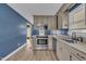 Neutral toned kitchen features stainless steel appliances, durable countertops, and stylish cabinets at 105 Poplar Dr. Dr, Clayton, NC 27520