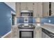 Stainless steel appliances, ample countertop space, and neutral color scheme at 105 Poplar Dr. Dr, Clayton, NC 27520